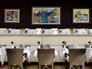 The Bristol - River Grille with paintings