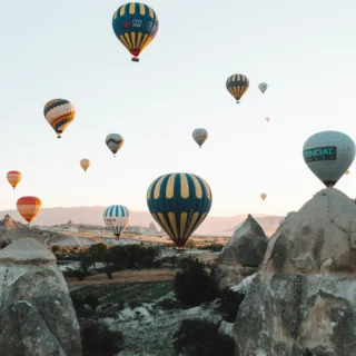 Turkey should be at the top of every traveler’s list for 2025. From its stunning coastlines to its rich history and vibrant culture, the country offers something for everyone. Start with the UNESCO-listed landscapes of Cappadocia, where you can soar over fairy chimneys in a hot air balloon. Then, unwind along the turquoise waters of the Turkish Riviera, with luxury resorts in places like Antalya and Bodrum. Istanbul, a perfect blend of East meets West, offers a wealth of historic sites, including the Hagia Sophia and Topkapi Palace, alongside lively bazaars and world-class cuisine.

For history lovers, Turkey is a treasure trove—home to ancient cities like Ephesus and Troy, and the legendary rock-cut churches of Göreme. Plus, Turkey’s renowned hospitality and delicious food—think meze, fresh seafood, and Turkish delights—make it a top culinary destination. With improved infrastructure and a year-round appeal, 2025 is the perfect time to explore Turkey’s diverse offerings.