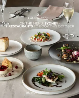 October brings its own particular appeal. Spring light spills across the harbour, terraces begin to fill, and the city seems to find every excuse to take the long way to dinner. From landmark dining rooms with front-row views of the Opera House to intimate neighbourhood restaurants where the cooking is every bit as memorable as the setting, these are seven Sydney tables worth securing in your diary this month.